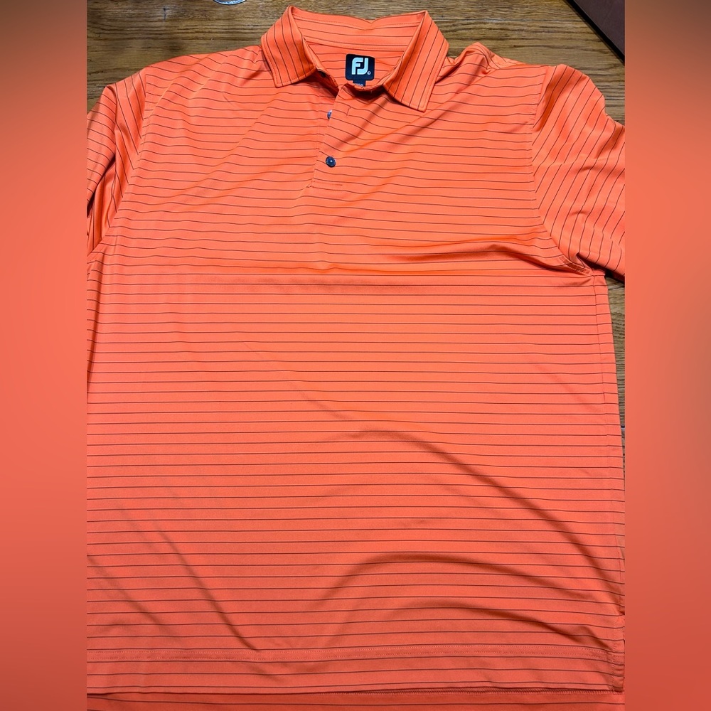 Footjoy (FJ) brand orange stripe men’s golf polo.  Great condition.  Size Large